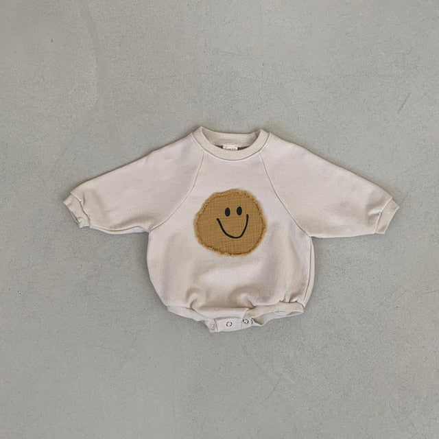 Mameluco del bebé de la sudadera de la cara sonriente