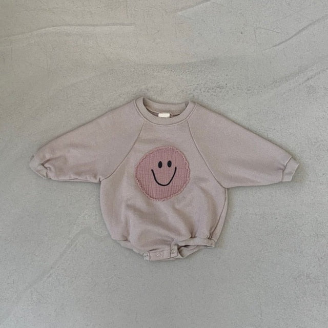 Mameluco del bebé de la sudadera de la cara sonriente